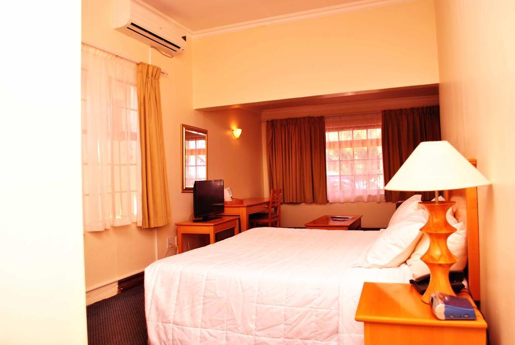 The George Hotel Manzini Rum bild